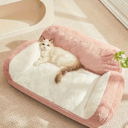 A cat lounging on an all-season fluffy pet sofa bed.
