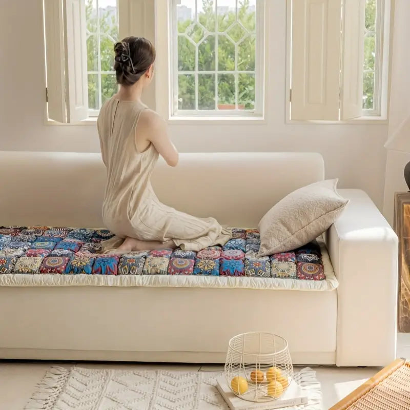 Close-up of intricate Moroccan pattern on sofa cover