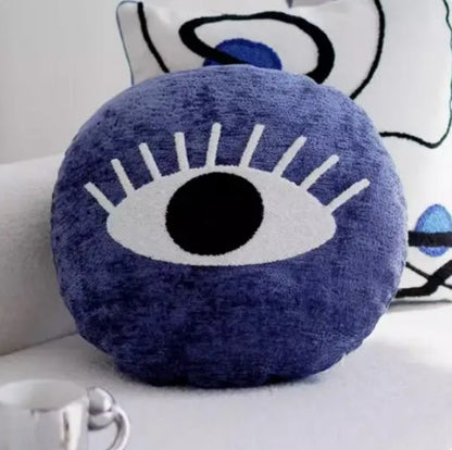 an eye design on a round pillowcase