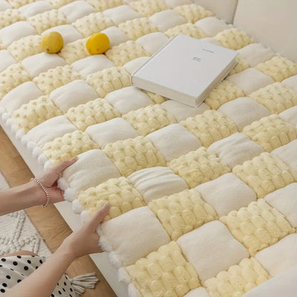 Close-up of thickened plush material on flannel sofa cover
