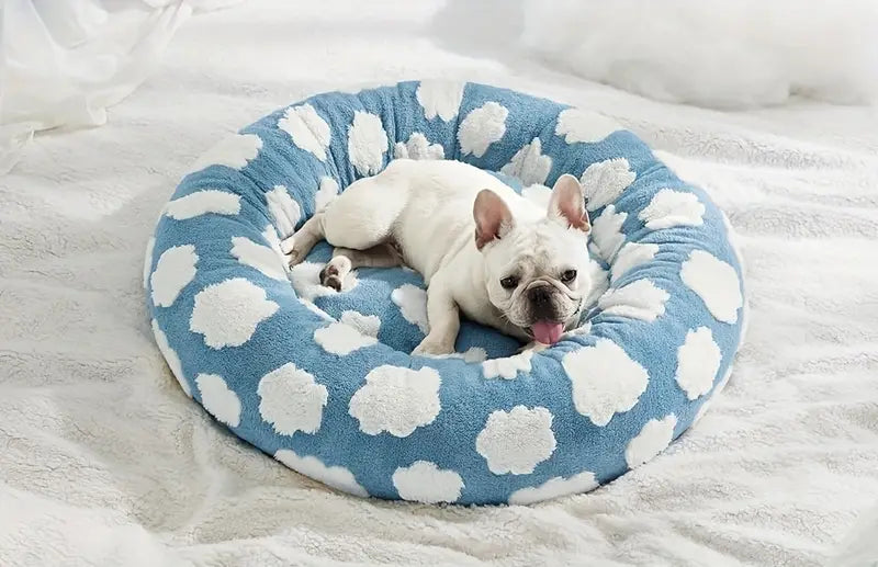 Soft and cozy cloud-pattern dog bed for small to medium breeds.