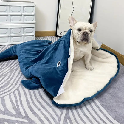 Self-warming shark-shaped dog nest for indoor dogs.
