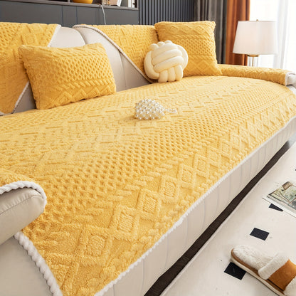 a yellow geometric-patterned sofa cover