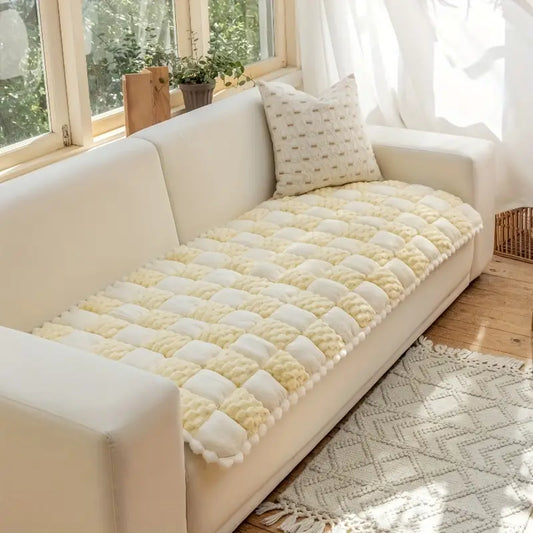 Sofa cover fitting snugly on a modern couch
