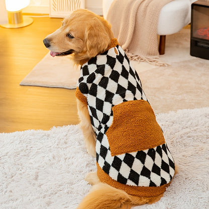 Close-up of the warm knit fabric and tartan pattern of the dog jacket.