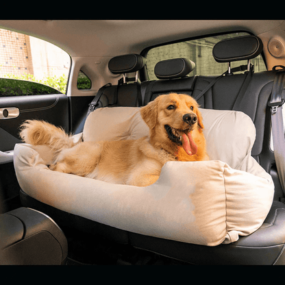 "A relaxed Golden Retriever laying comfortably on the backseat in a car, enjoying the ride."