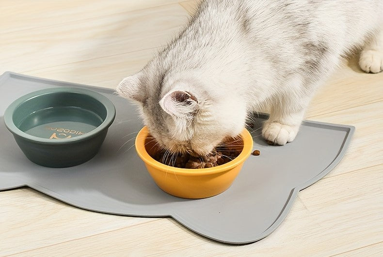 Eco-friendly, food-grade pet mat that safely contains spills and crumbs in grey color