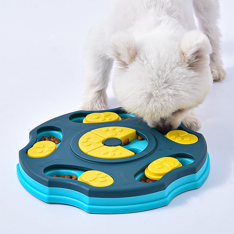 A dog using the Smart Interactive Dog Toy in blue color