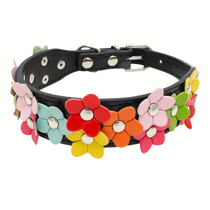 Black dog collar with a pattern of bright, multicolored flowers.