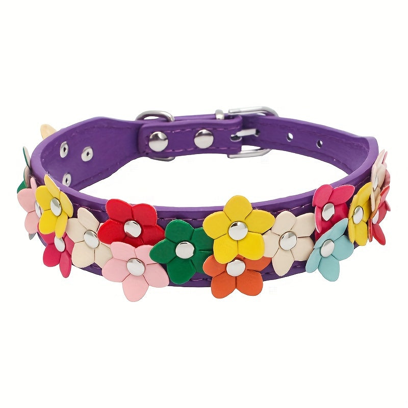 Purple dog collar with a design of multi-colored flowers.