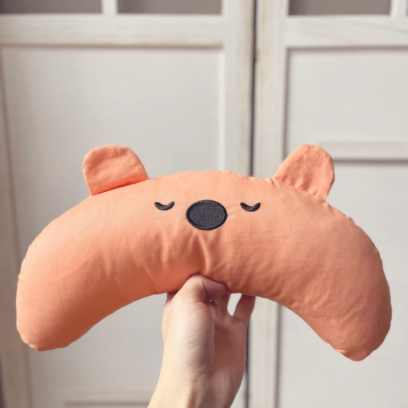 Cartoon Bear Dog Pillow in cozy home setting.