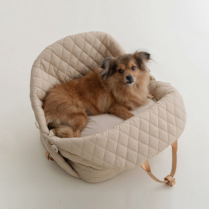 Pet tote and car seat in beige color.