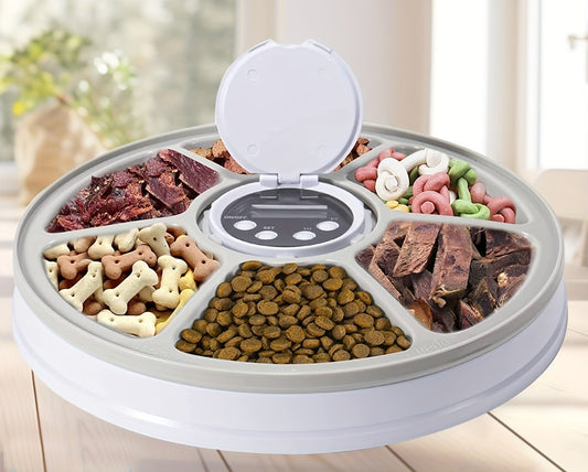 an automatic pet feeder  with various types of pet treats and food. 