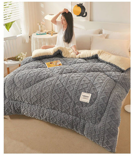 "Lady sitting up in bed, wrapped in a luxurious grey velvet plush pet blanket."