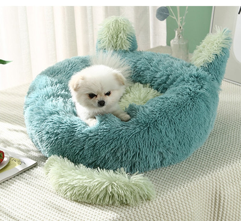 Plush round cat bed, perfect for curling up and lounging.