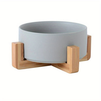 Ergonomic dog bowl elevated on wooden rack in grey color