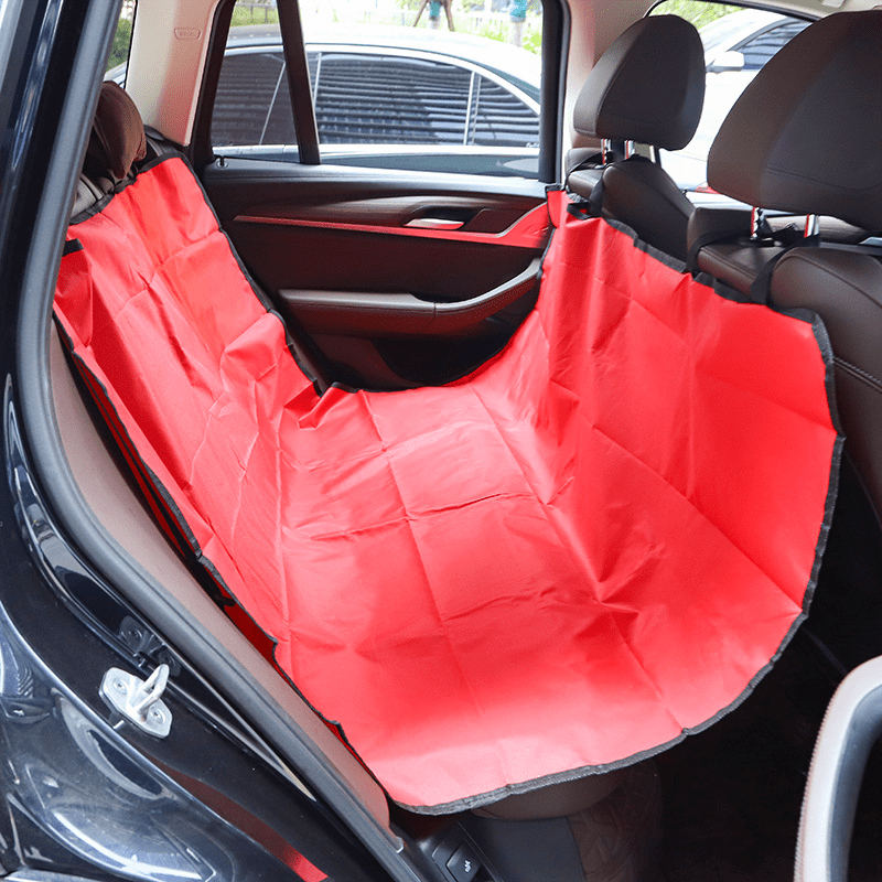 Machine-washable waterproof pet car seat cover in hammock style for hassle-free maintenance.