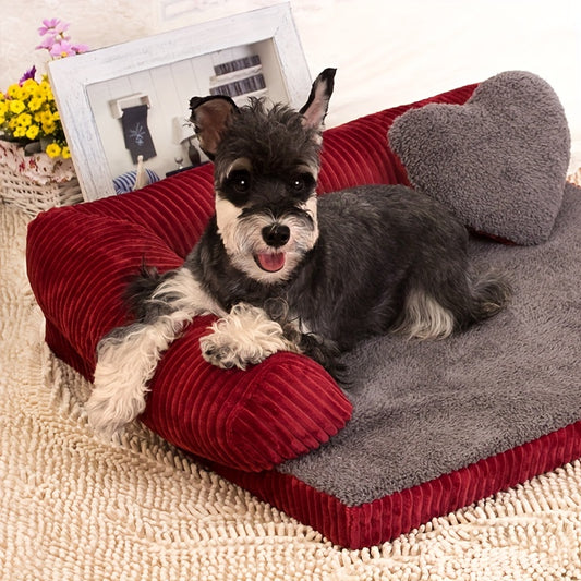 A plush corduroy dog sofa bed, showcasing a reversible design in red color