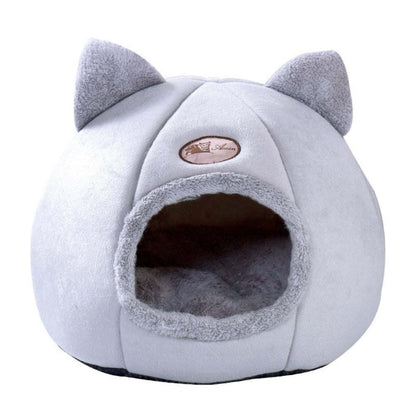 Two-in-one pet bed featuring charming ears and a soft, detachable cushion.