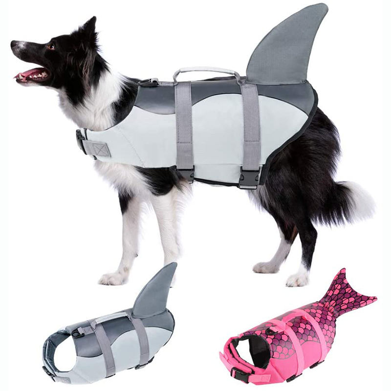 "Dog sporting a grey shark fin water vest, product details visible below."
