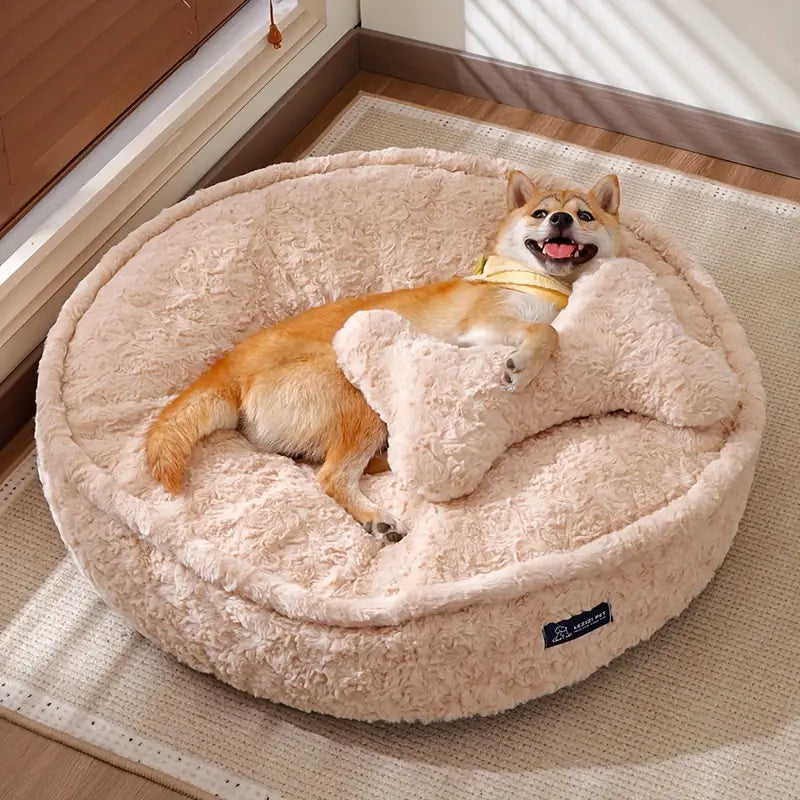 A dog resting on a soft pet bed.
