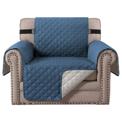 "Pastel blue waterproof sofa cover snugly fitted on a chair."
