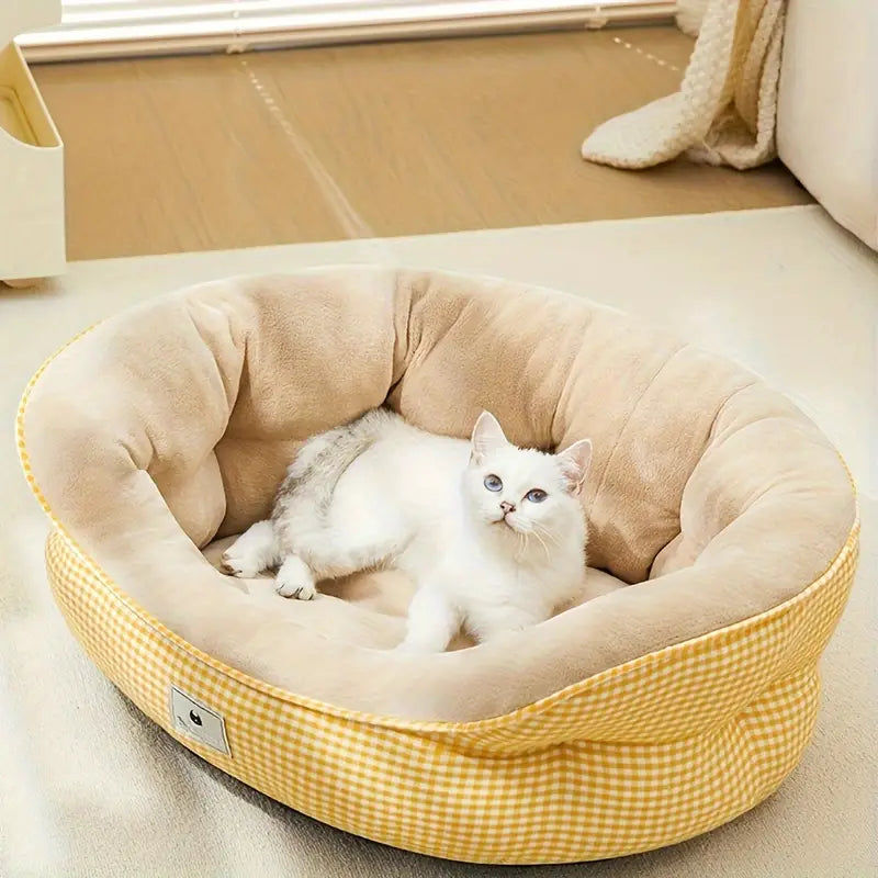 Round donut pet bed for small dogs and indoor cats.
