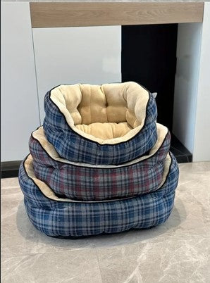 Thickened plaid pet bed for cold weather comfort.
