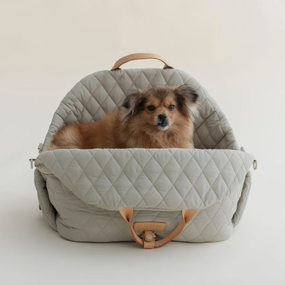 Innovative pet tote converts into a dog car seat in grey green color