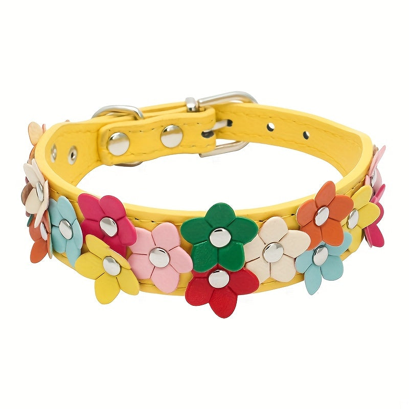 Yellow dog collar embellished with a colorful floral pattern.