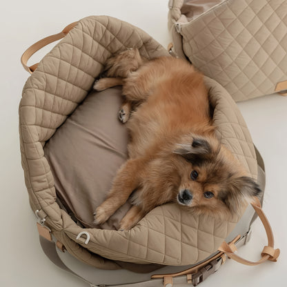 Stylish dual-use pet tote doubling as a safe dog car seat for travel.