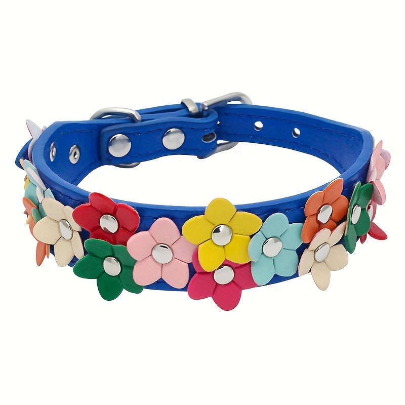 Dark blue dog collar with a floral pattern in yellow, red, and white.