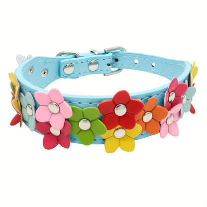 Skyblue dog collar decorated with a variety of colorful flowers.