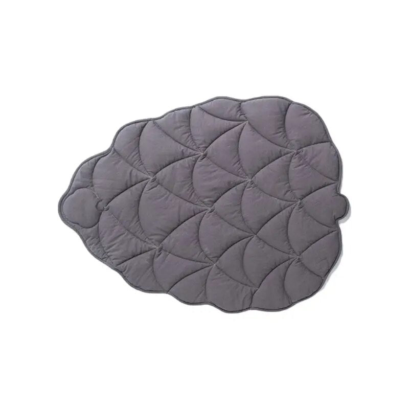 "Quilted pet mat/blanket in a rich grape color with leaf design."
