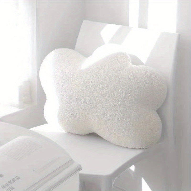 Soft and cozy cloud-shaped pillow in a cozy bedroom setting