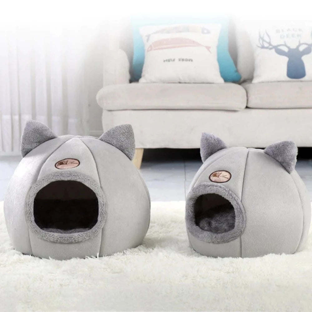 Cozy hideout for your pet, complete with cute ears and a removable, fluffy cushion.