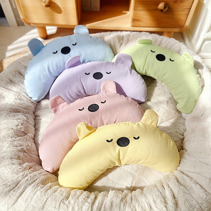 Multiple colors of plush cartoon bear pillow.